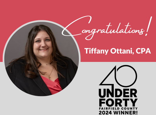 smiling female CPA Tiffany Ottani in black suite with Congratulations for winning 2024 40 Under Forty award