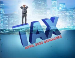 Upset man standing on huge tax letters