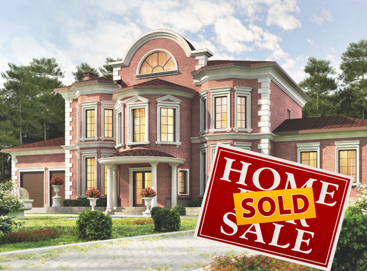 large house with sold sign in front