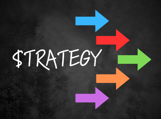 the word "strategy" with arrows pointing to the right