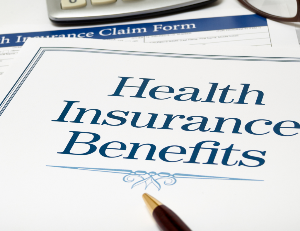 Health Insurance Benefits written on paper