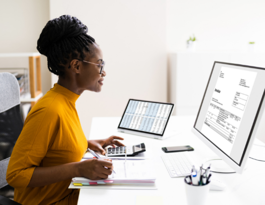 African American woman accountant at computer