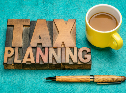 word tax planning and cup of coffee
